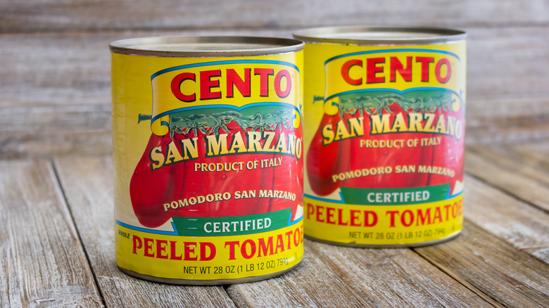 two cans of San Marzano tomatoes