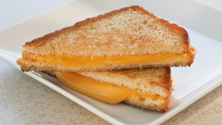 Grilled cheese sandwich sliced in half