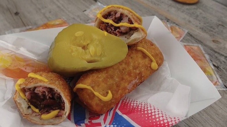 Corned beef egg roll with a pickle