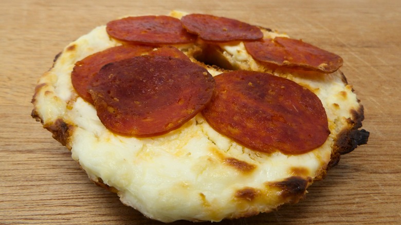 Pepperoni and cream cheese on toasted bagel