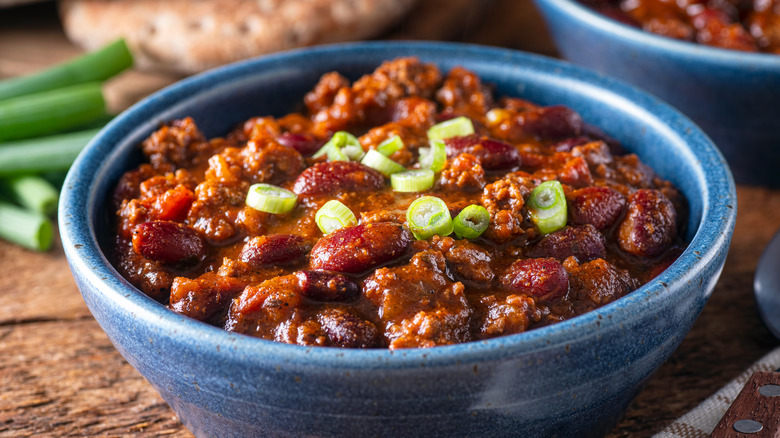 Chili bowl topped with scallions