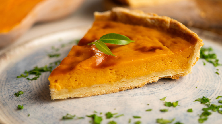 Pumpkin pie sprinkled with herbs