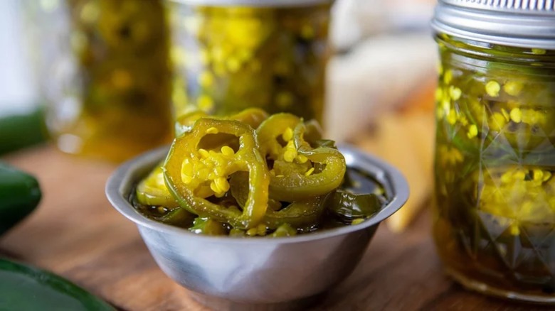 Candied jalapeños in silver bowl