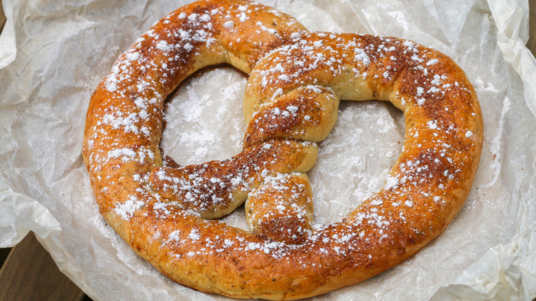 Sweet soft pretzel on paper