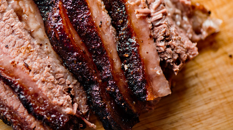 Sliced brisket on a wodden board