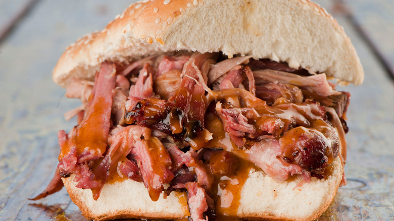 brisket sandwich cut in half