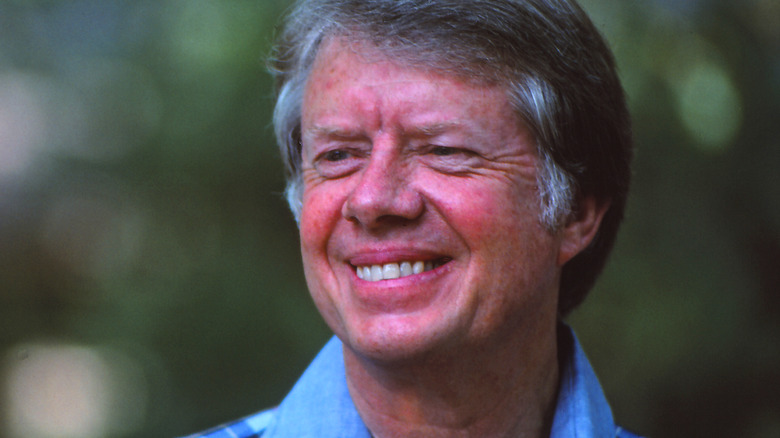 Jimmy Carter in blue shirt