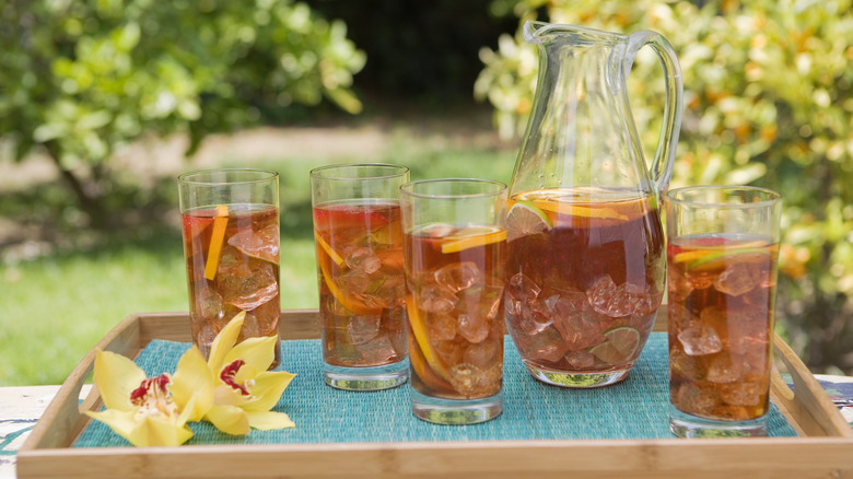 Pitcher and glasses of iced tea