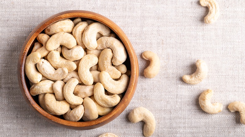 brown bowl of cashews