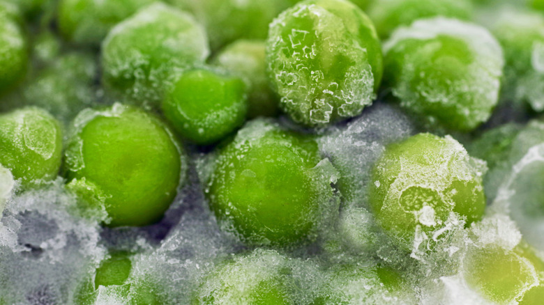 Closeup of frozen green peas