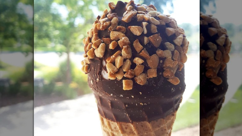 Frozen ice cream cone with peanut topping