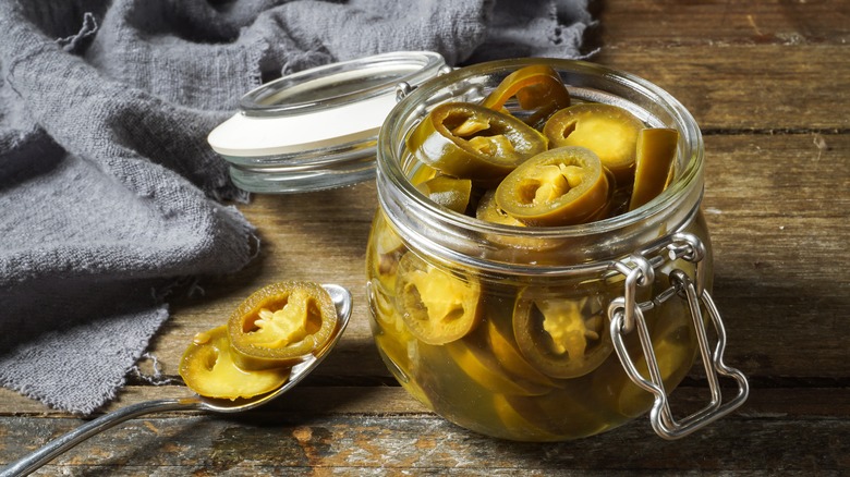 pickled jalapeños in a jar