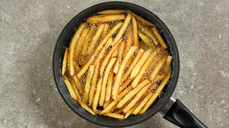 Fries in oil in a too-shallow pan