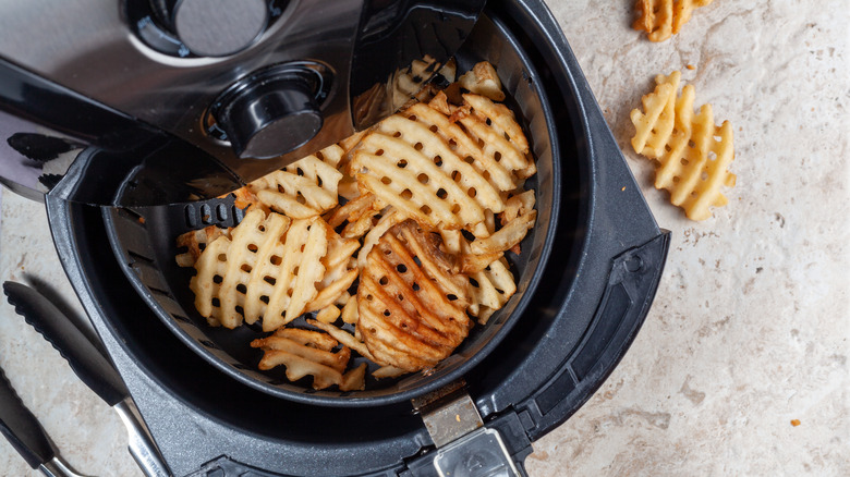 Waffle fries in air fryer basket