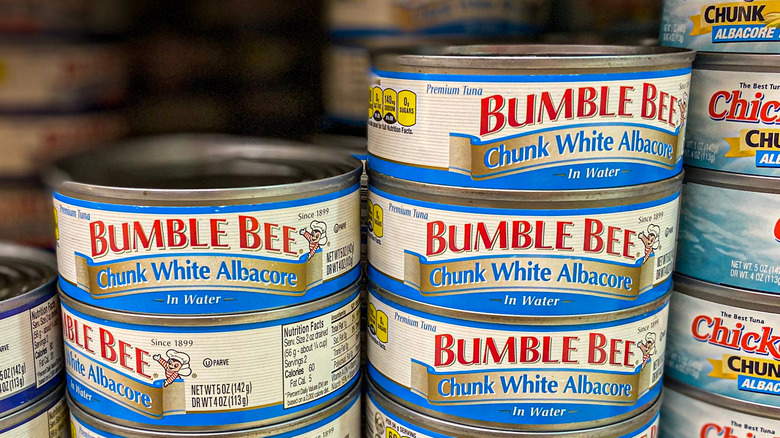 cans of tuna on a shelf