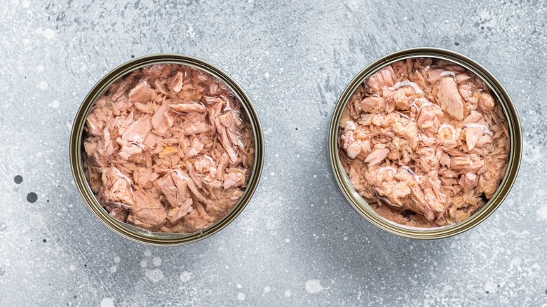 two opened cans of tuna