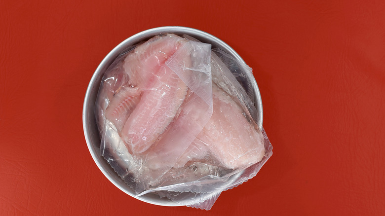 thawing vacuum sealed fish in bowl