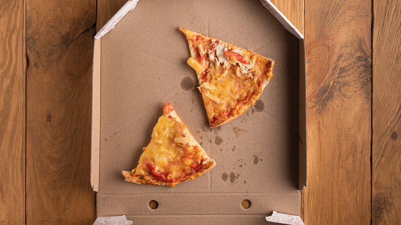 pizza slices in box