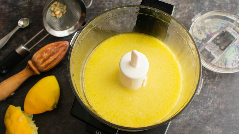 Salad dressing being prepared in blender