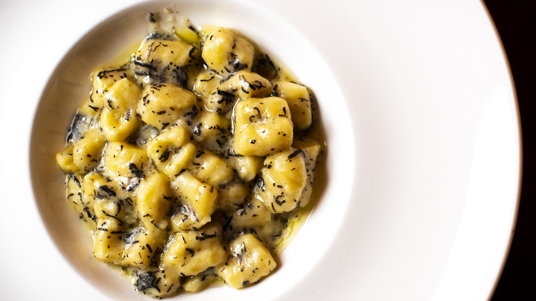 bowl of gnocchi in creamy sauce