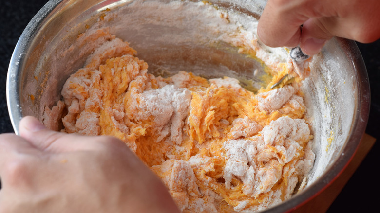 pumpkin gnocchi dough being mixed