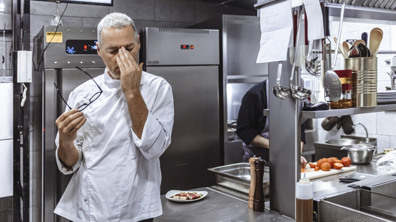 Chef massages eyebrows