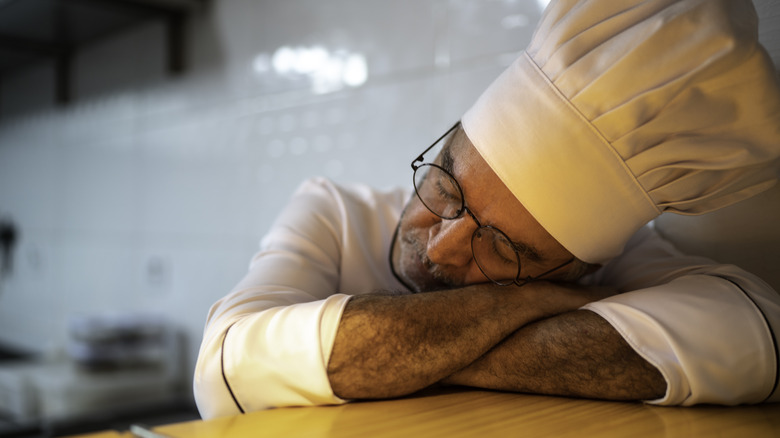 Chef napping on counter