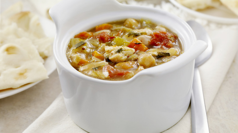 chicken and vegetable soup in bowl