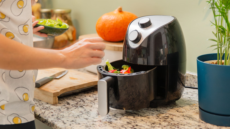 putting vegetables in air fryer