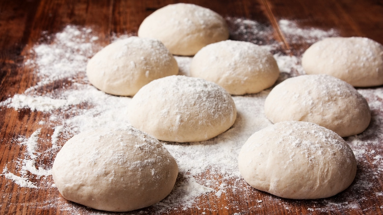 pizza dough balls on counter