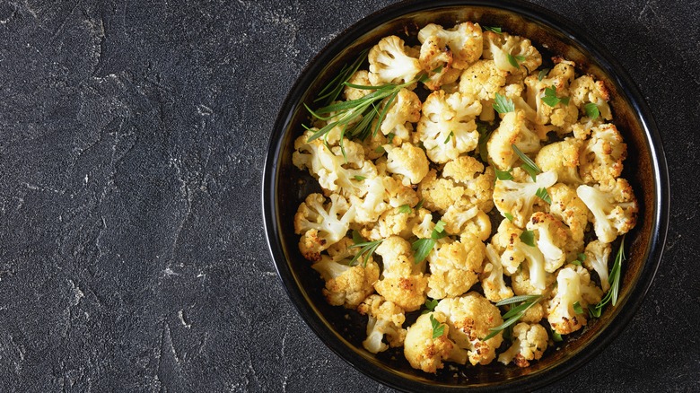 bowl of roasted cauliflower with herbs