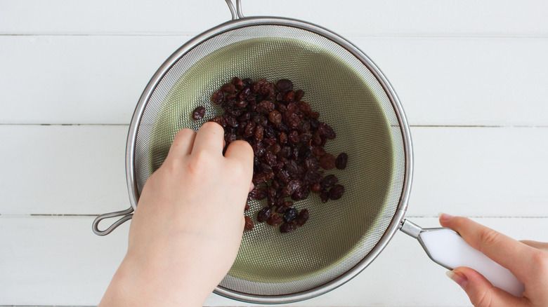 raisins in a sieve