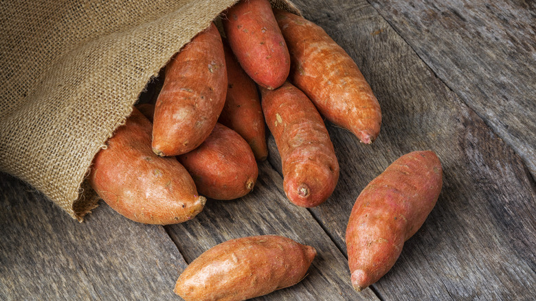 sweet potatoes in burlap bag