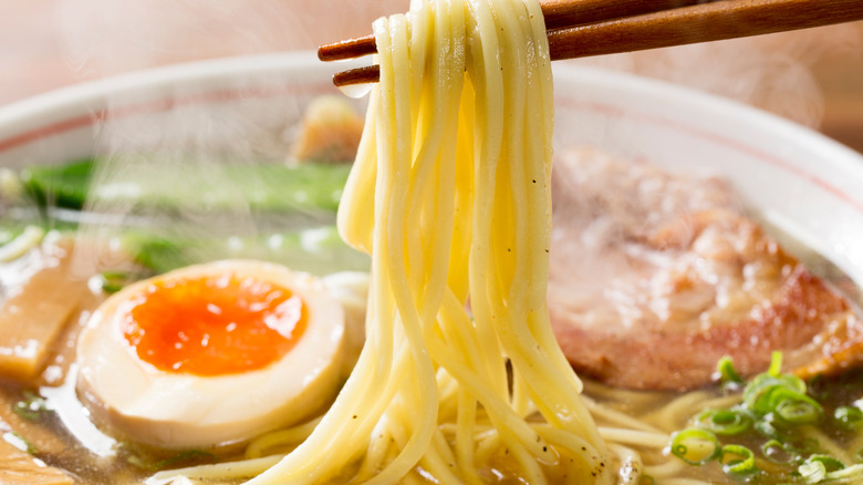 Bowl of ramen noodles with chopsticks