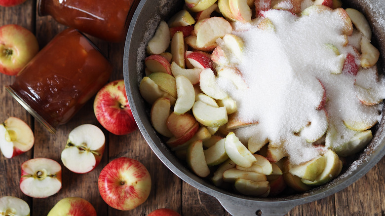 sliced apples and sugar in a pot