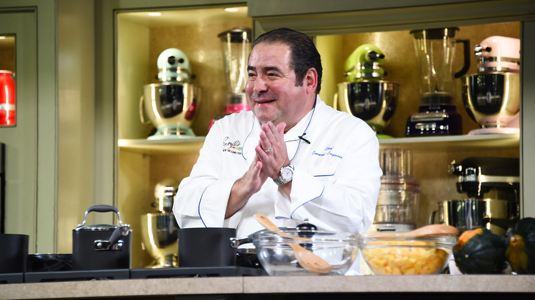 Emeril Lagasse with supplies ready to cook