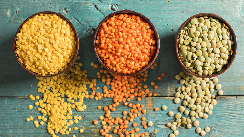 three types of dried lentils in bowls