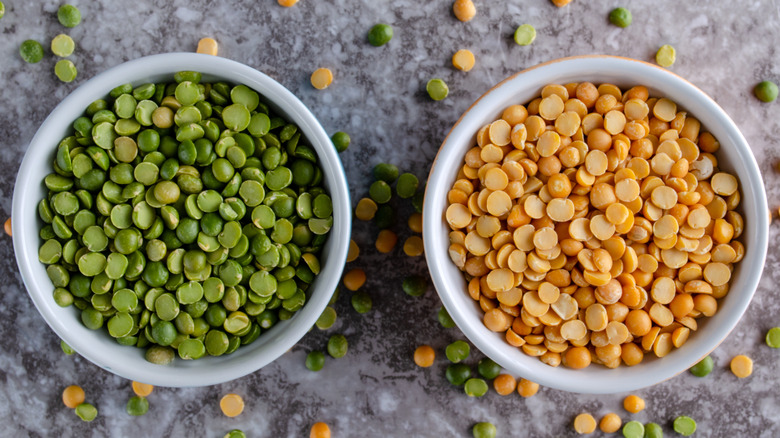 two bowls of yellow and green split peas