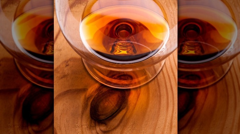 glass of brandy on table