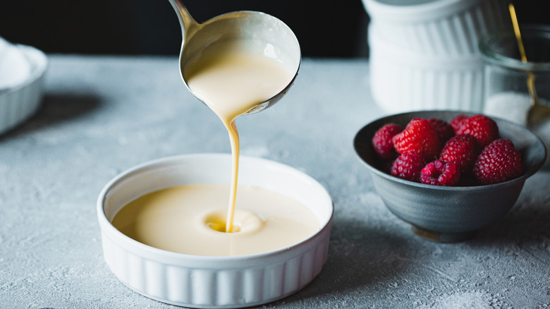 custard ladled into dish 