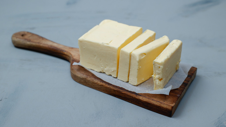 Butter on wooden board