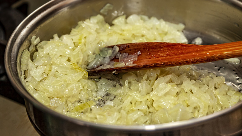 sauteing onion in pan