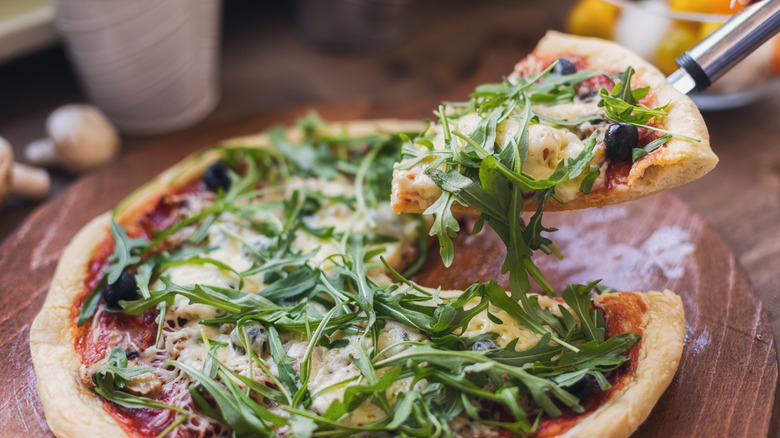 fresh arugula on pizza