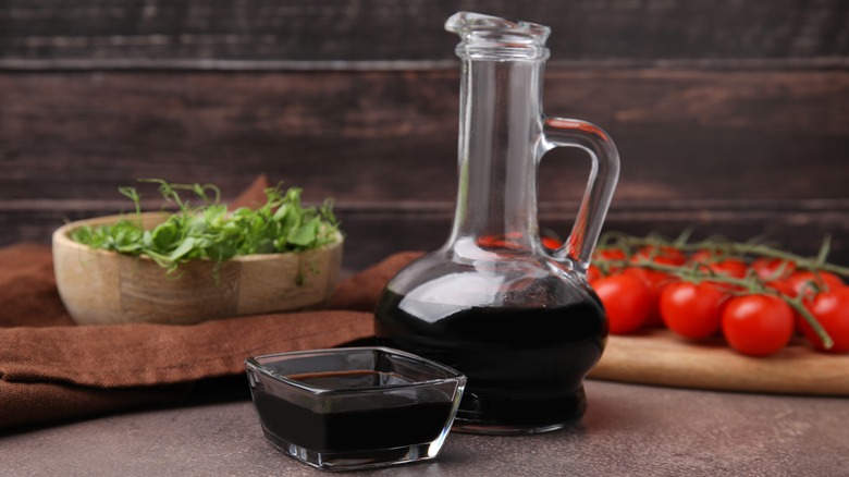 balsamic vinegar in glass bottle and bowl