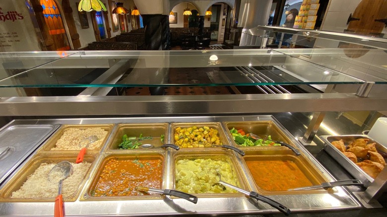 Buffet table with Indian food