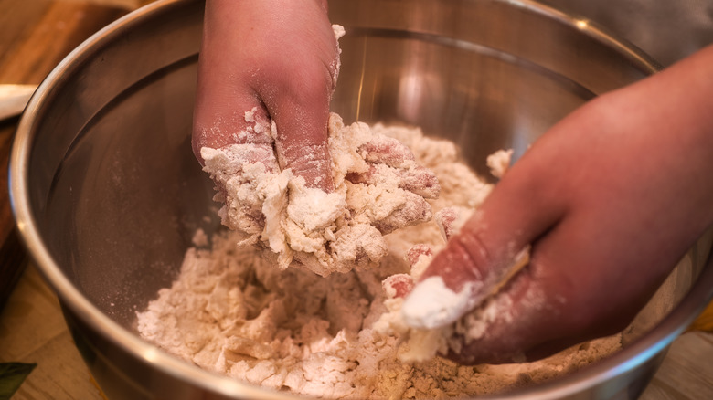 incorporating cornmeal in bowl