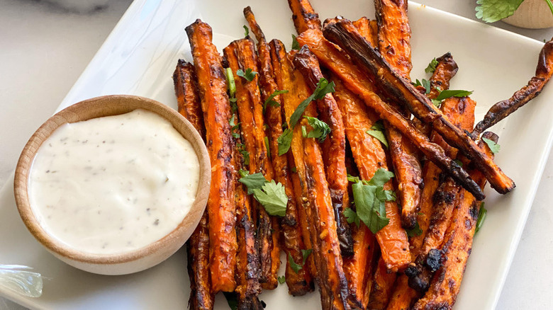 plate of carrot fries with creamy dip