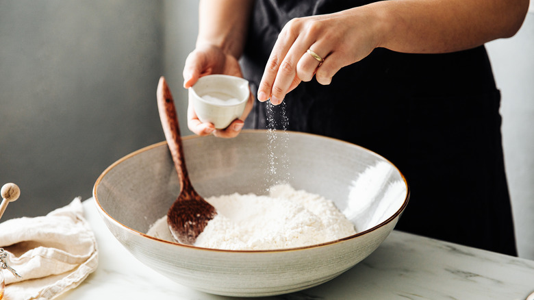 adding salt to flour