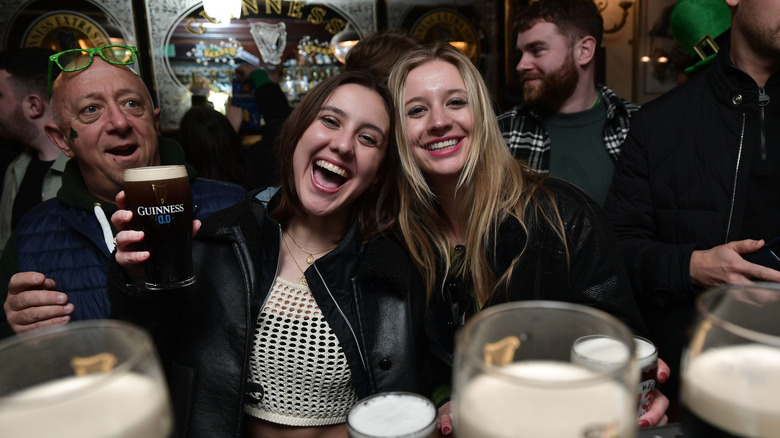 Patrons celebrating at Irish pub