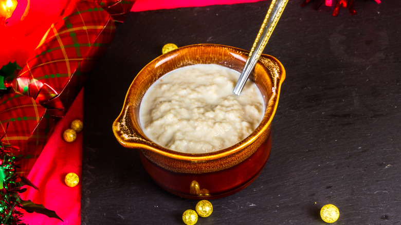 Dish of bread sauce on table